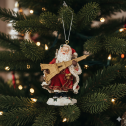 "Santa Claus carrying the Eiffel Tower" Christmas ornament