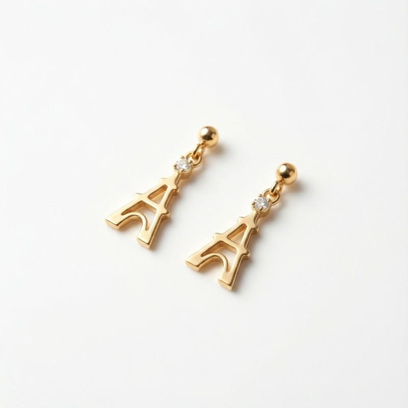 Boucles d'Oreilles Tour Eiffel Dorée